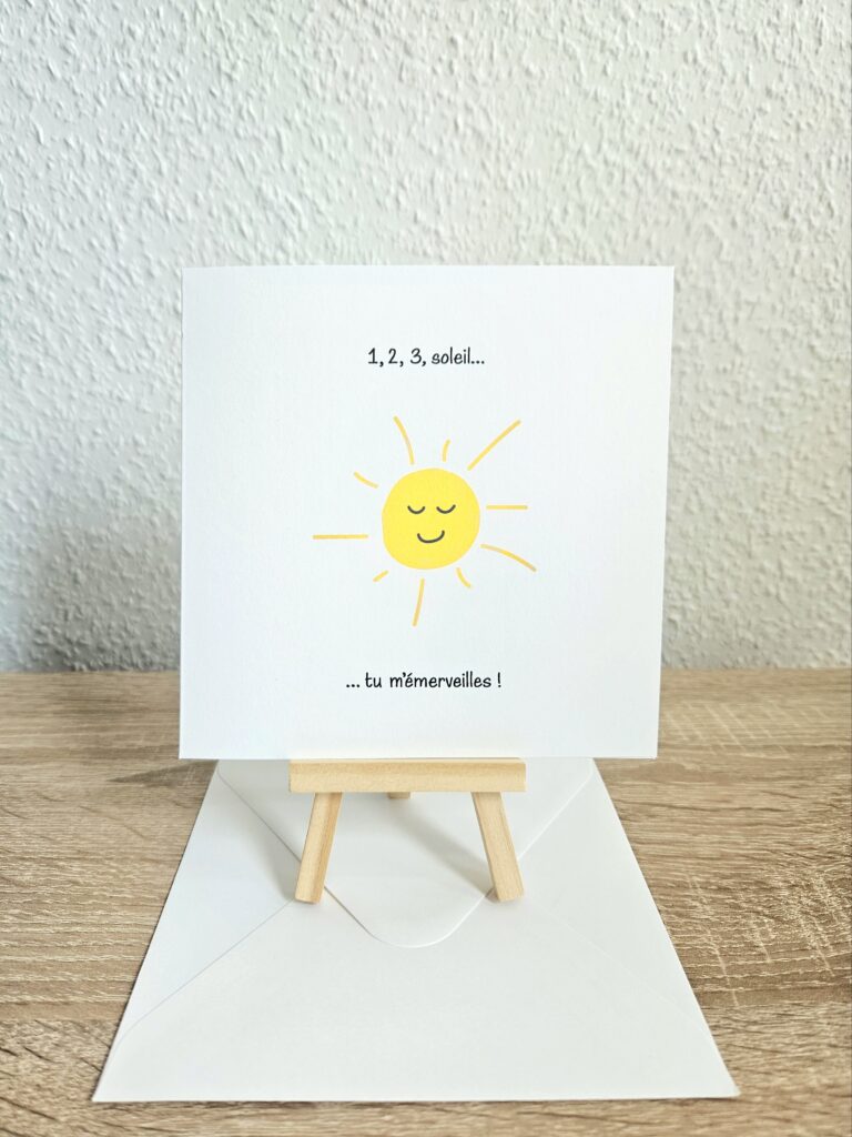 Carte avec un soleil souriant et le texte "1, 2, 3, soleil… tu m’émerveilles !".