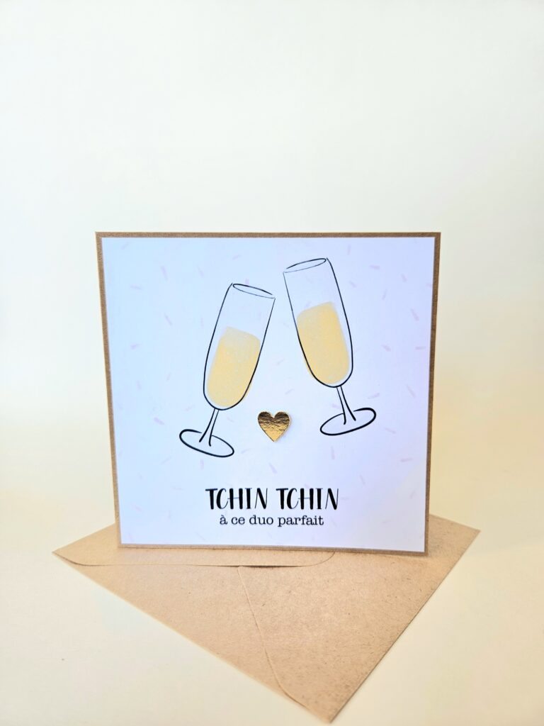 Carte de mariage avec deux flûtes de champagne qui trinquent et le message "Tchin tchin à ce duo parfait".