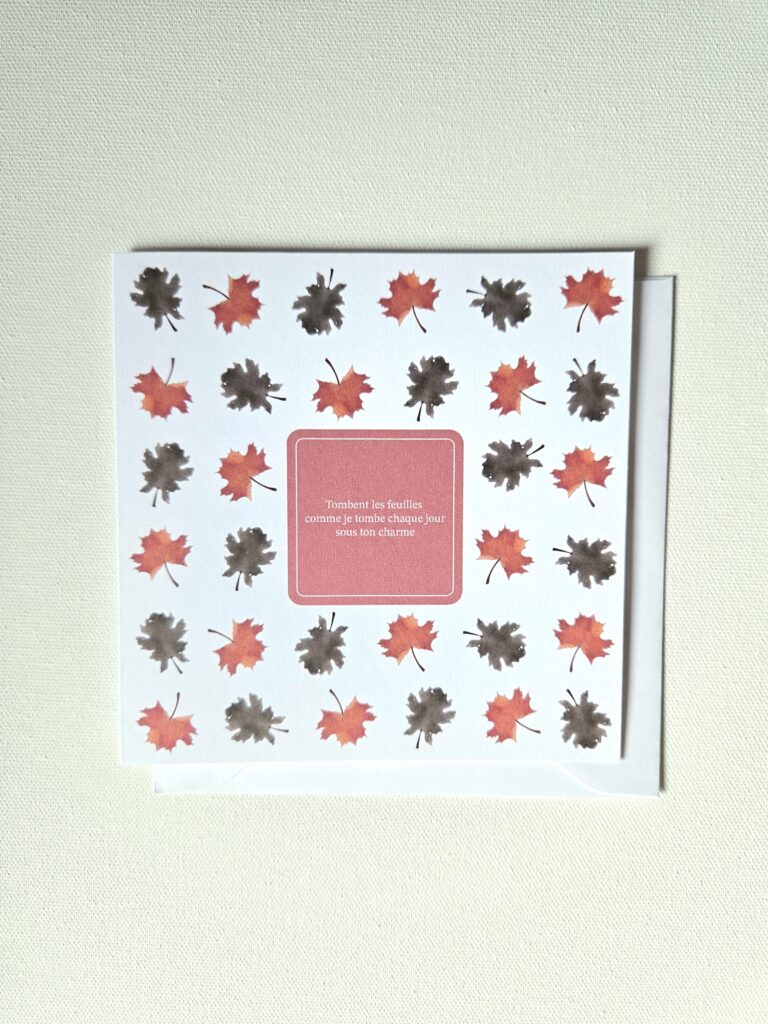 Carte d’automne décorée de feuilles rouges et brunes avec un message d'amour au centre